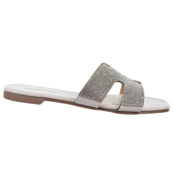 Isteria Zueco sintético con fantasía y suela plana de goma muy ligera y flexible. Tus zuecos mas elegantes para este verano.