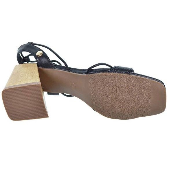 Isteria Sandalia sintética. Tiras en pierna y planta acolchada. Tacón 7cm de altura imitación madera y suela antideslizante