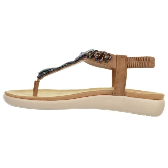 Sandalia esclava en sintético con fantasía y talón elástico, plantilla confort textil y suela de goma muy ligera y flexible.