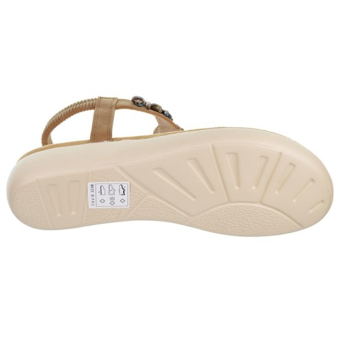 Sandalia esclava en sintético con fantasía y talón elástico, plantilla confort textil y suela de goma muy ligera y flexible.