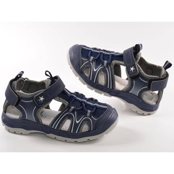 1942 Crecendo Sandalia Sandalia sintética y textil. Forro textil y plantilla acolchada de piel. Cierre con velcro. Puntera de go