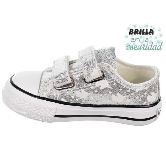 14169 Osito Zapatilla en textil metalizado. Estampado que brillan en la oscuridad. Forro textil. Velcro. Suela antideslizante.